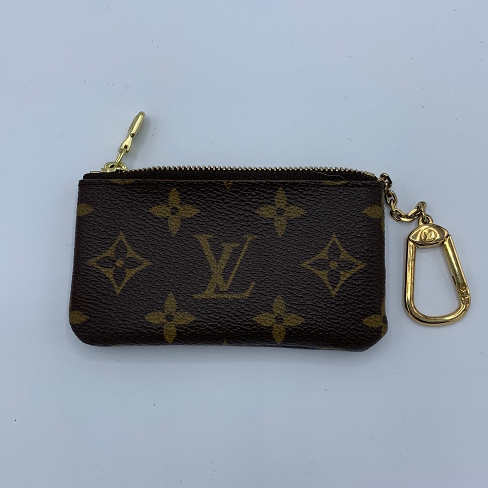 Louis Vuitton Monogram key pouch 4.5”W x 2.5”H x 0.5”D